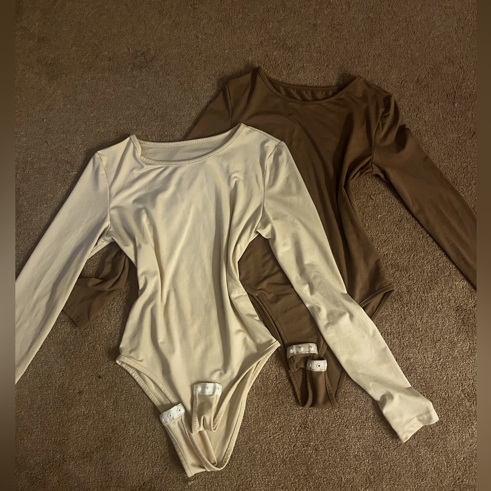 2 stretchy Bodysuits